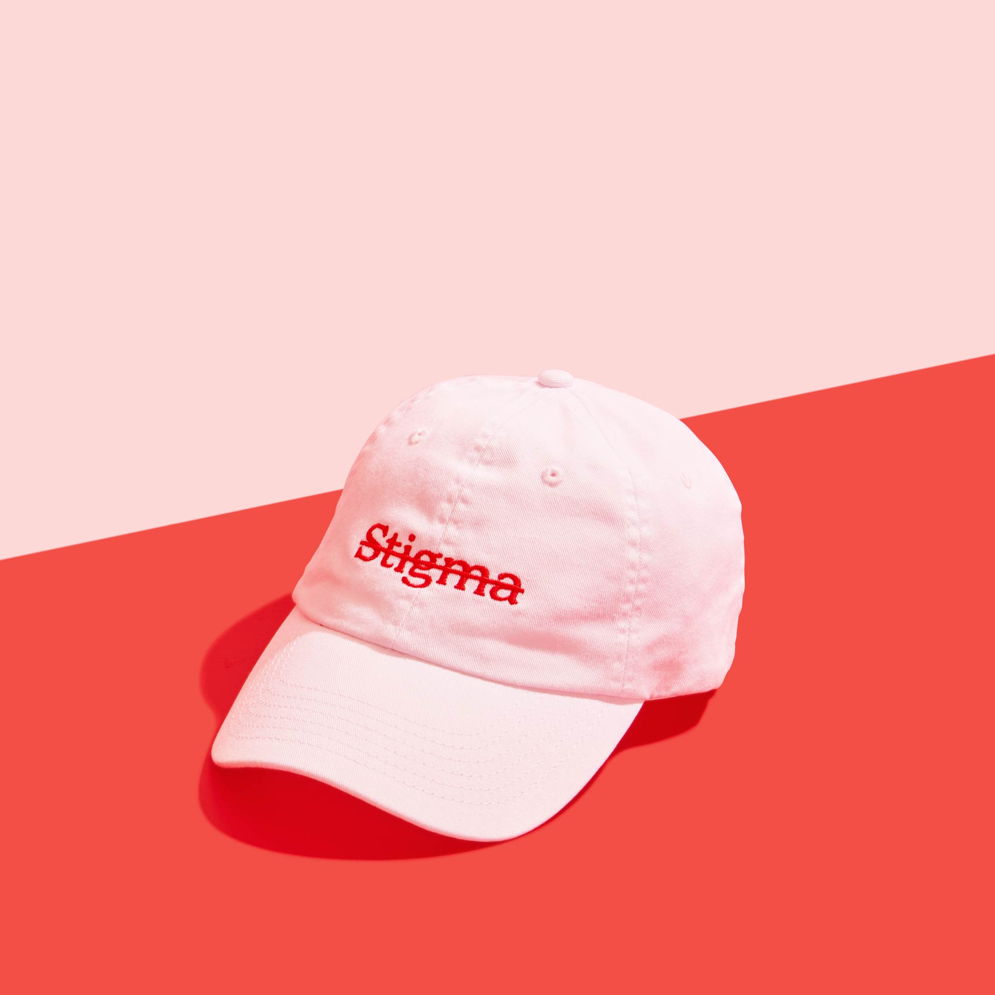 Wisp stigma hat on a pink and red background