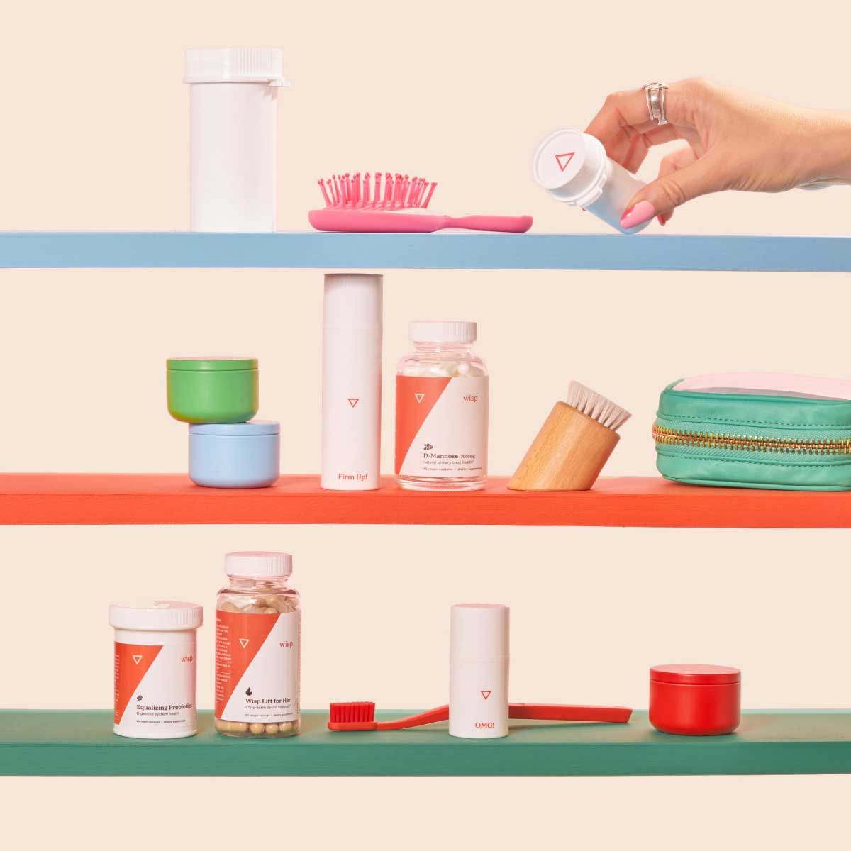 A woman's hand reaching for a Wisp medication bottle on colorful shelves with various Wisp medication bottles in front of a cream background