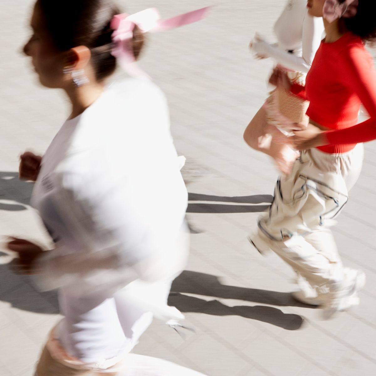 A group of women jogging outdoors