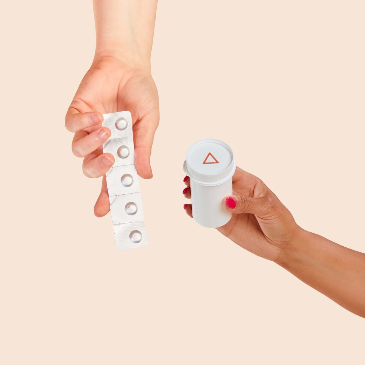Wisp Norethindrone Acetate, Zofran, and Harmonizing Lube with a cream background