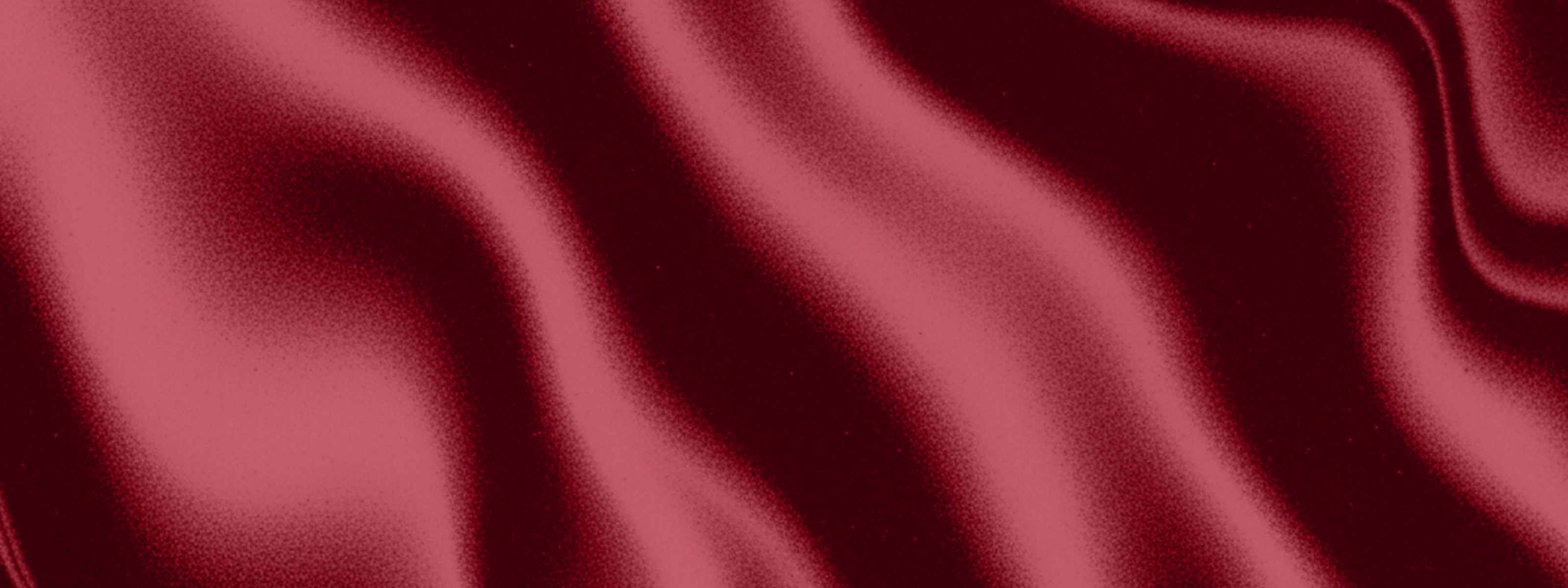A wavy dark red pattern resembling a silk sheet