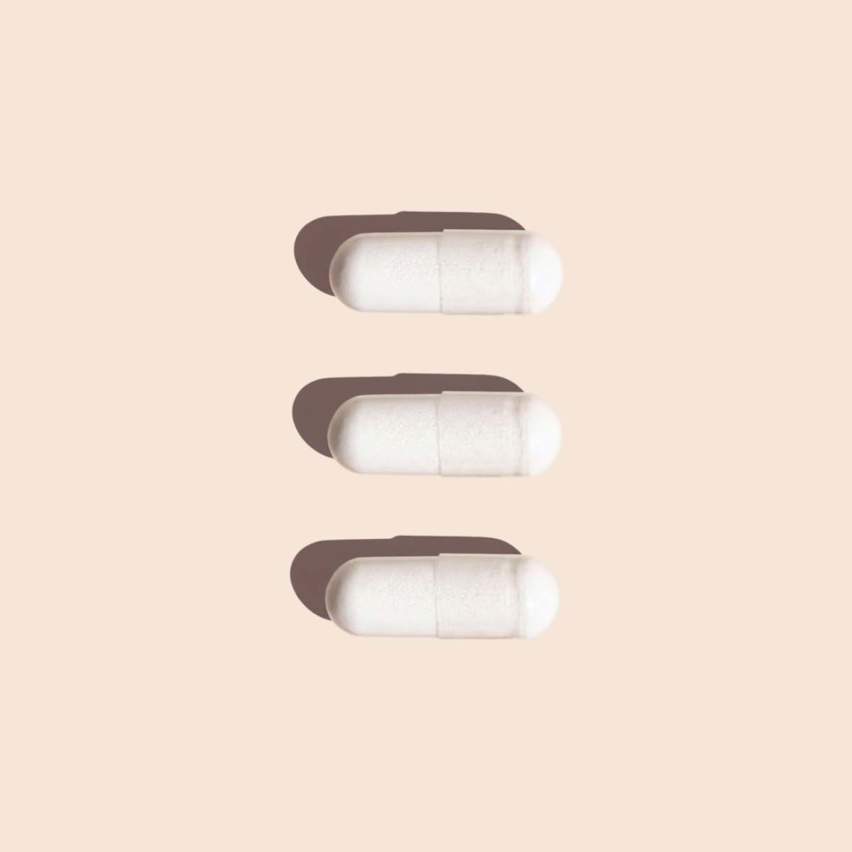 Lysine capsules on cream background