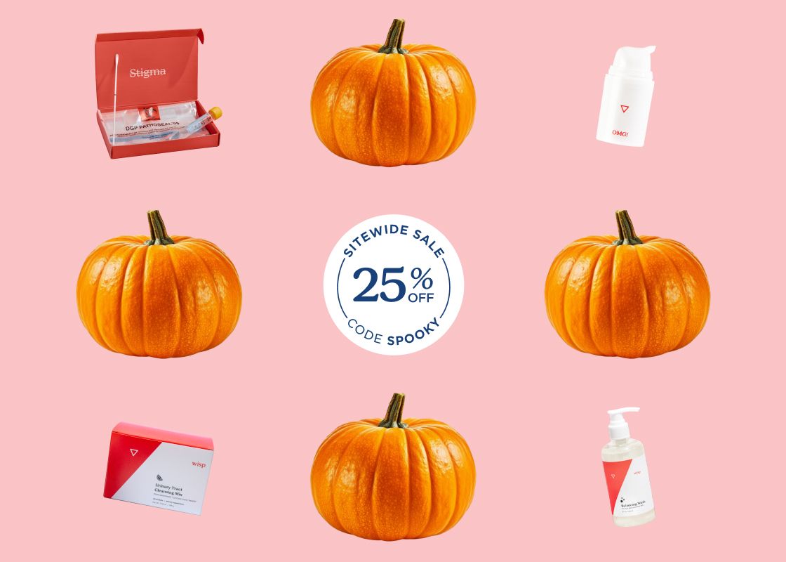 Pumpkins and various Wisp products with a pink background