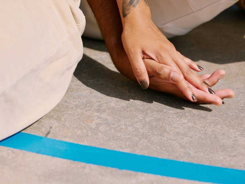 close up of two hands gently clasped together