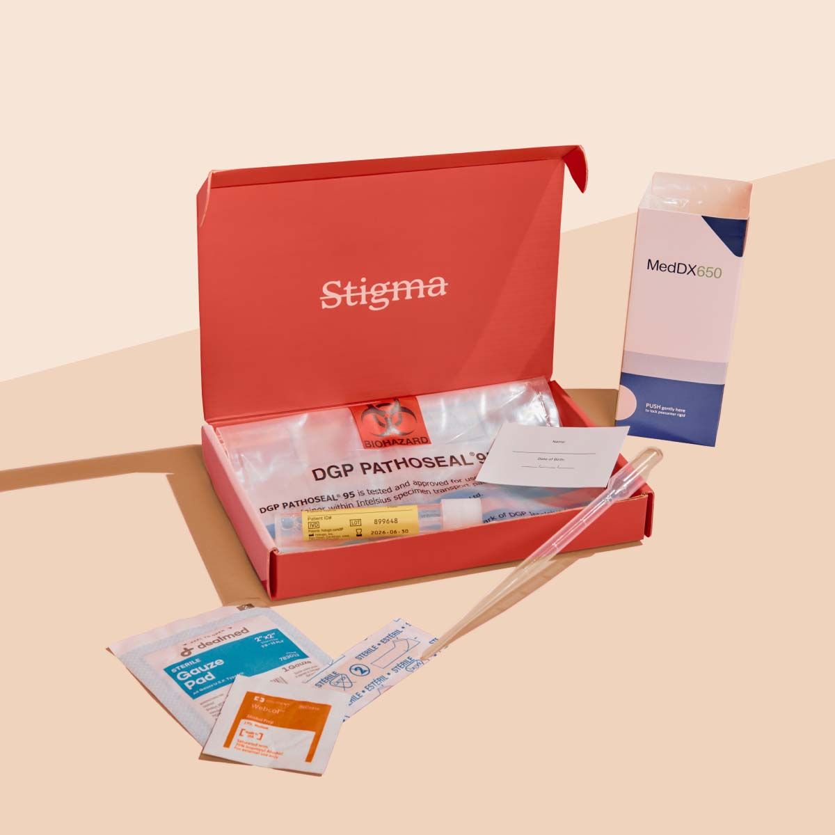 A Wisp diagnostics box with sample collection supplies on a cream surface