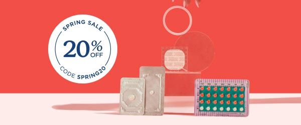 2 Emergency Contraception packets and a birth control packet, ring, and patch are balanced on a clear block on a pink surface with a red background