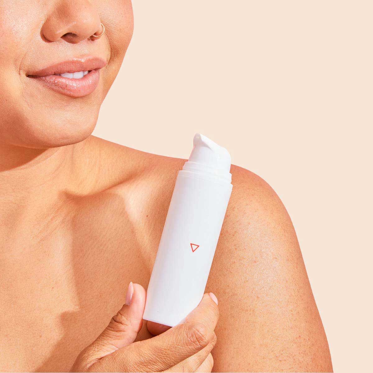 Wisp Whole Body Deodorant on a cream surface